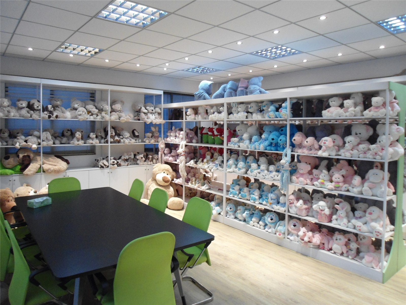 Sample room with plush collections on display